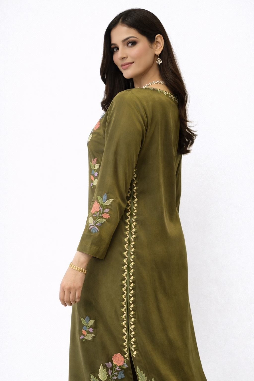 Olive raw silk long Close-up of Olive Enigma dress in raw silk with multi-color floral appliqué and embroidery, handcrafted in Pakistan for Eid 2026. urta kaftan 